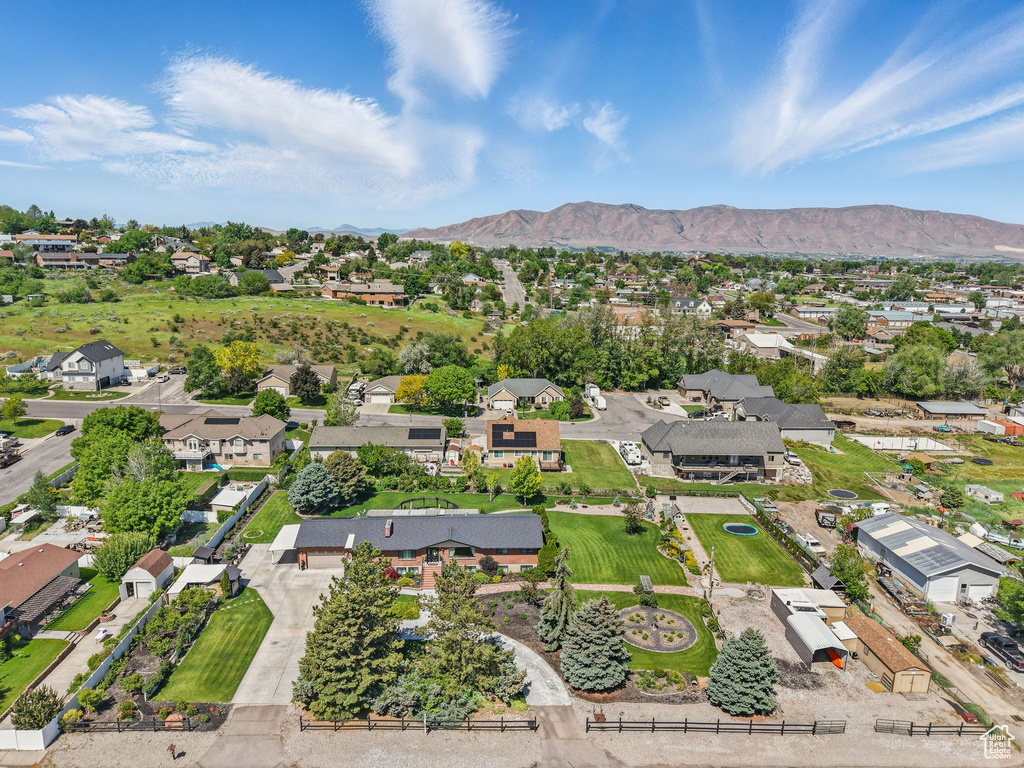 Aerial view of residential area with a mountain backdrop
