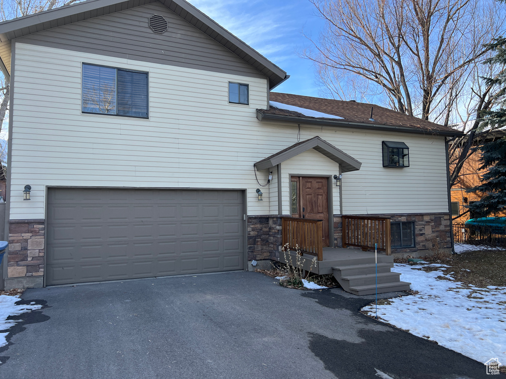 View of front of home with a garage