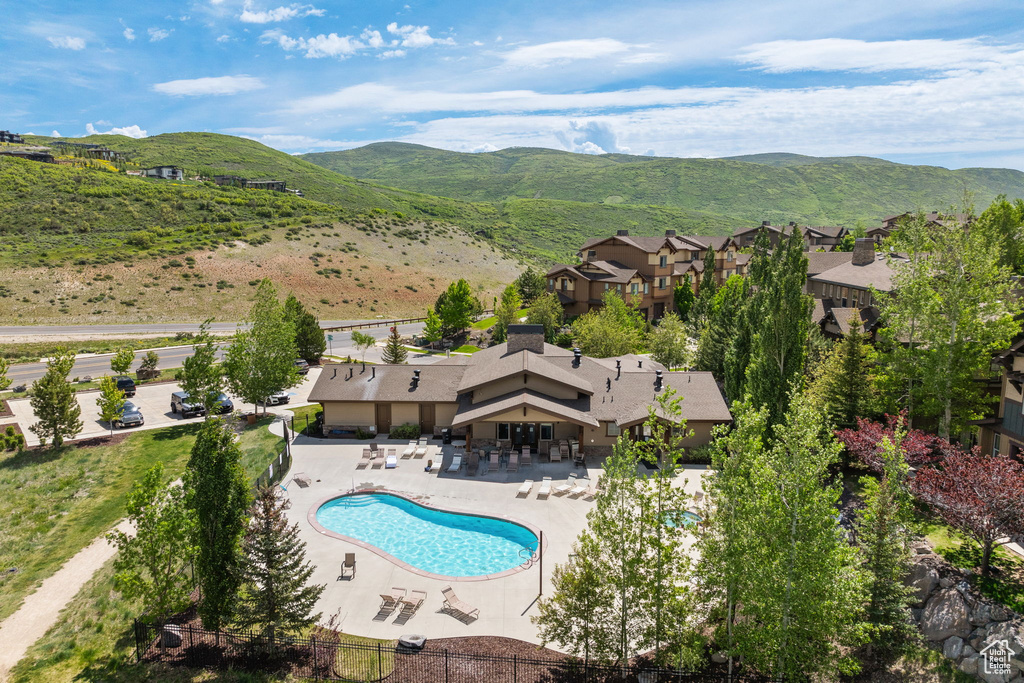 Aerial view of mountains and a pool area