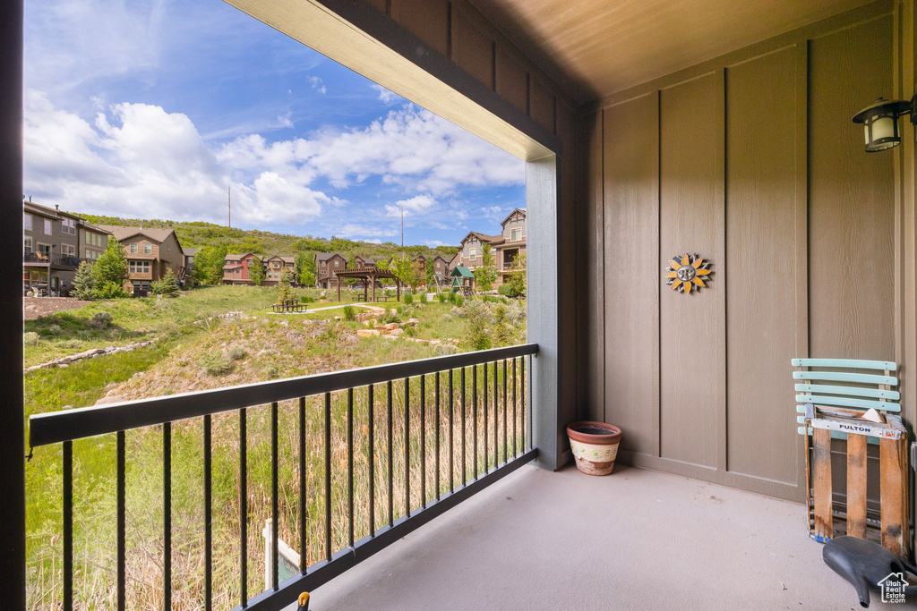 Balcony featuring a residential view