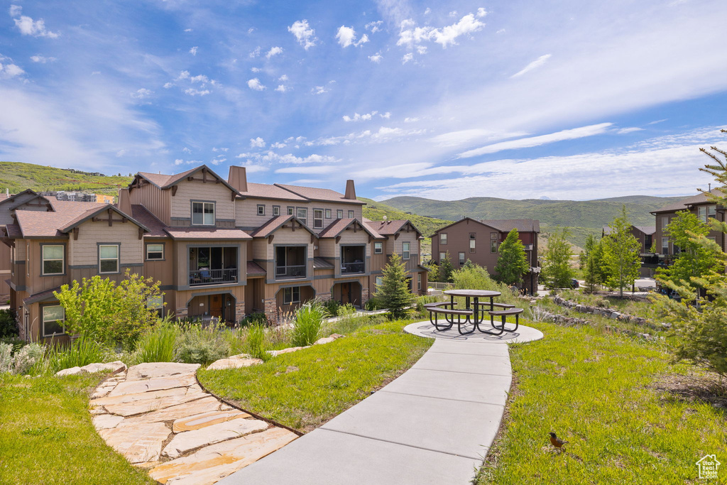 View of community with a residential view and a mountain view