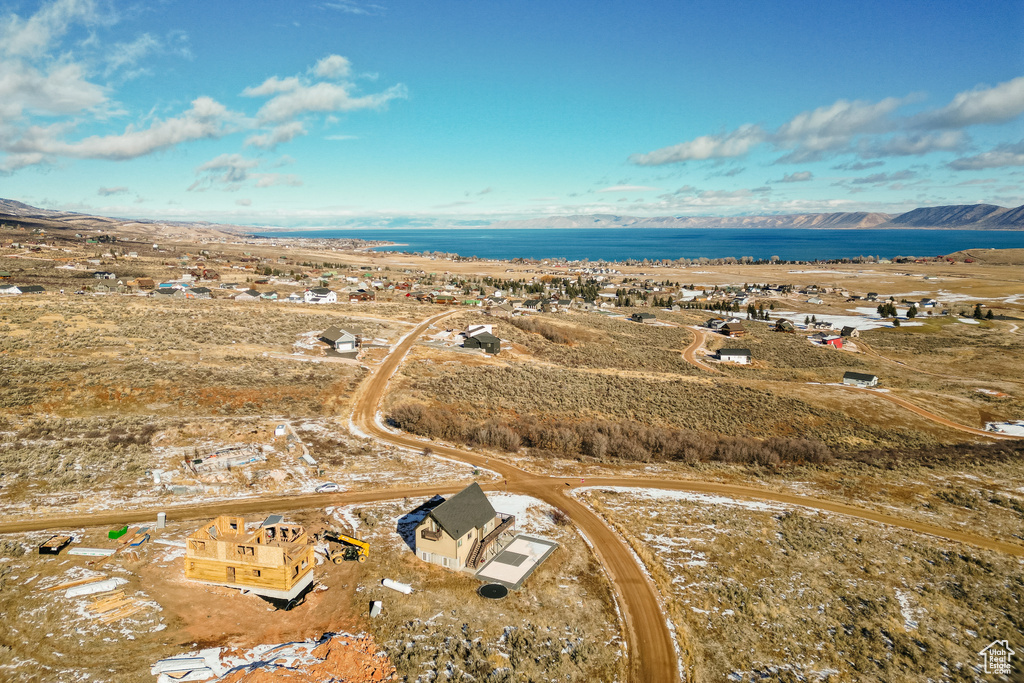 Birds eye view of property with a mountain view