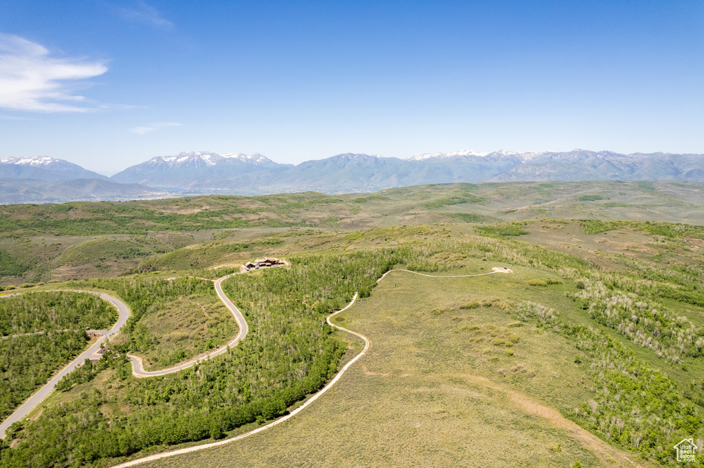 Birds eye view of property featuring a mountain view