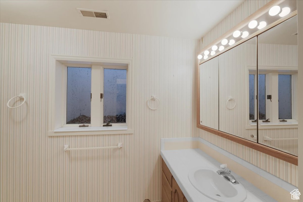 Bathroom featuring vanity