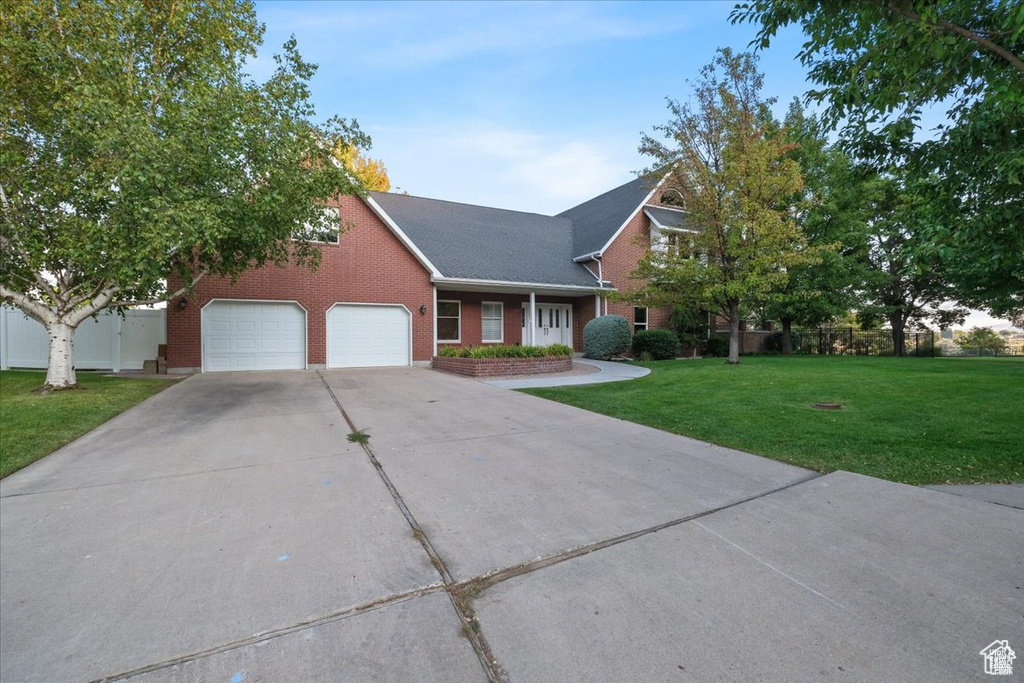 View of front of house with a front lawn