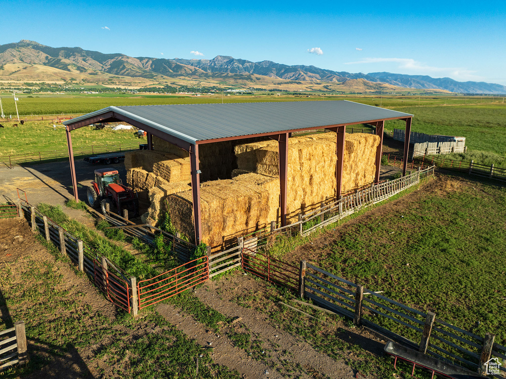 View of outbuilding with a mountain view and a rural view