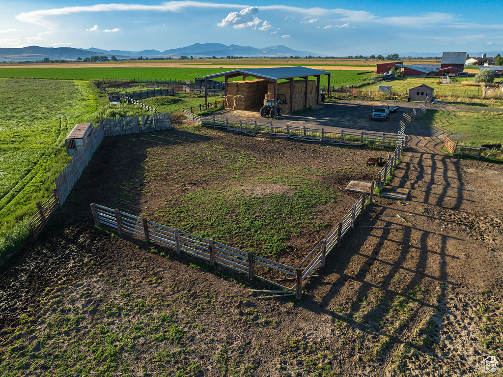 Birds eye view of property featuring a mountain view and a rural view