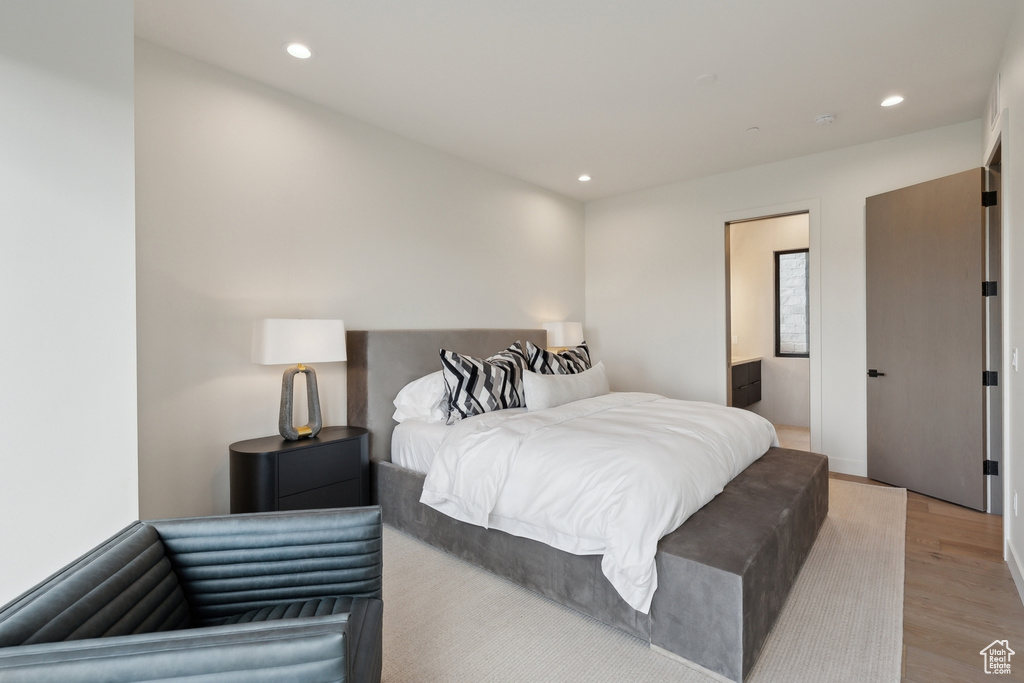 Bedroom featuring light wood-style floors and recessed lighting