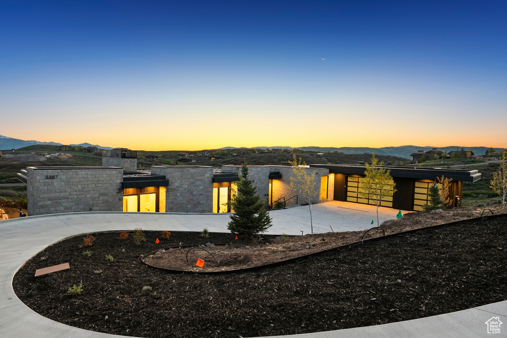 View of front of property with a mountain view