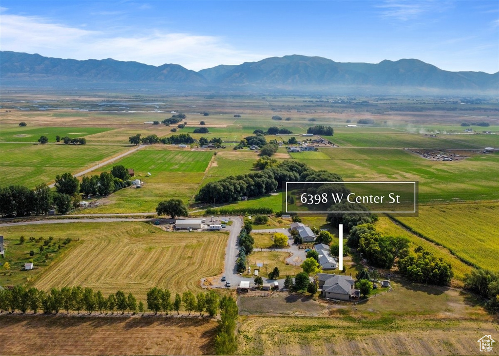 Drone / aerial view with a mountain view and a rural view