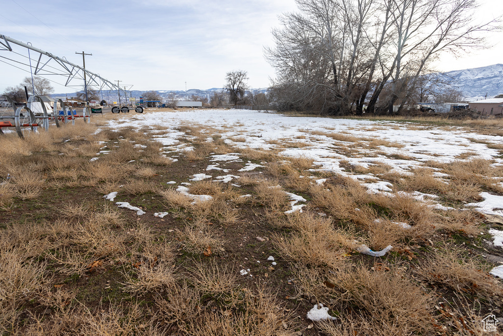 View of yard featuring a mountain view