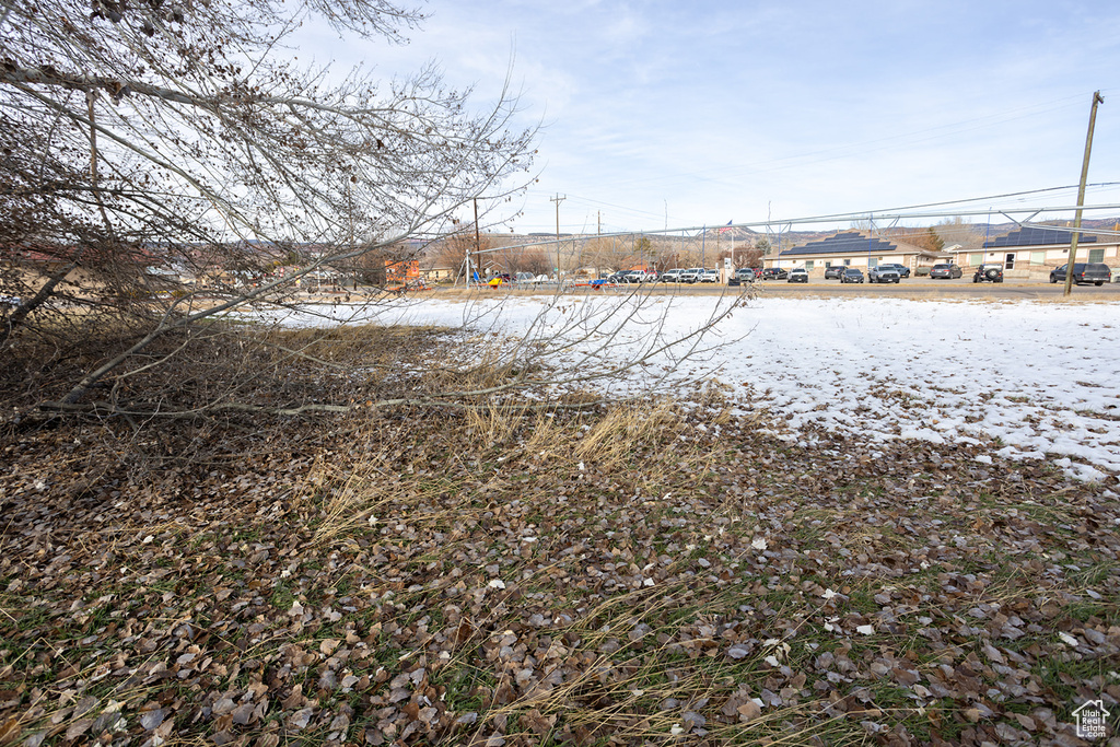 View of yard covered in snow