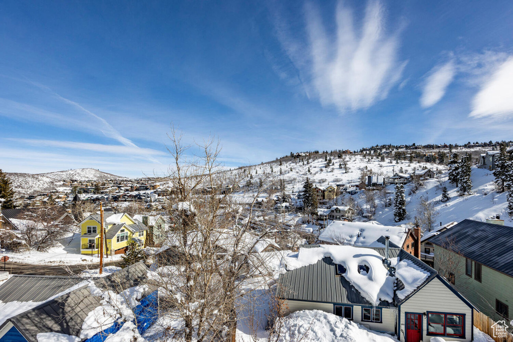 View of mountain backdrop with nearby suburban area