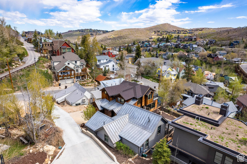 Aerial perspective of suburban area featuring mountains