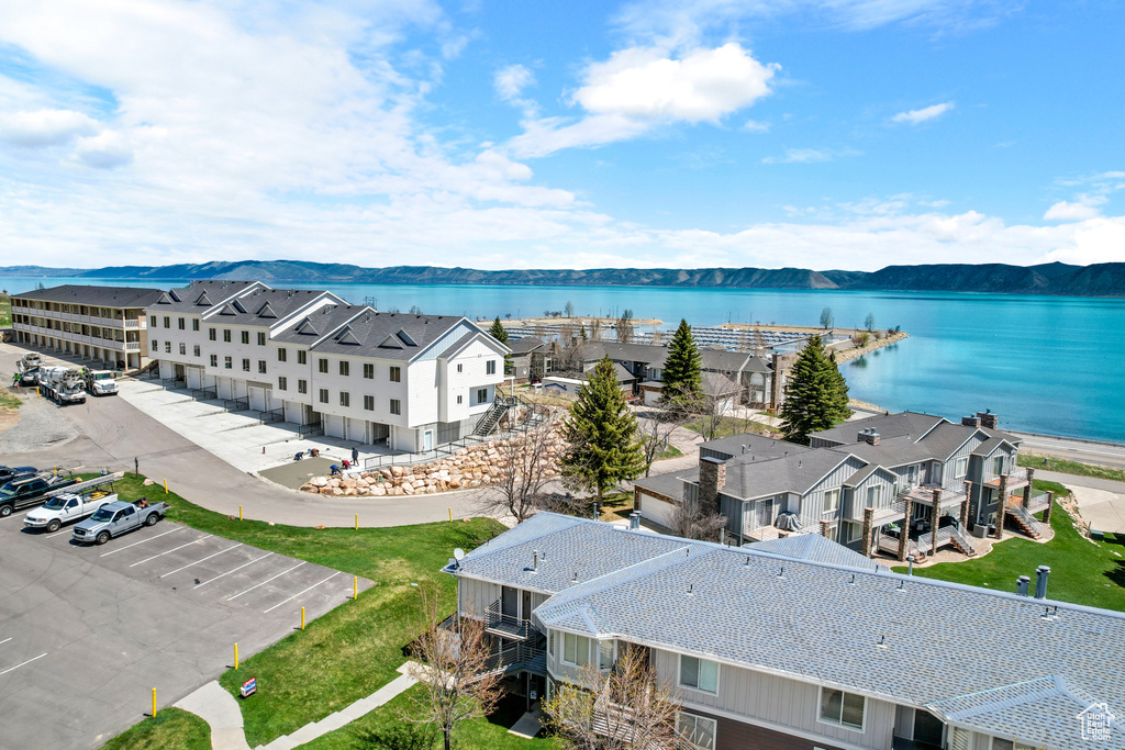 Aerial view of residential area with a large body of water