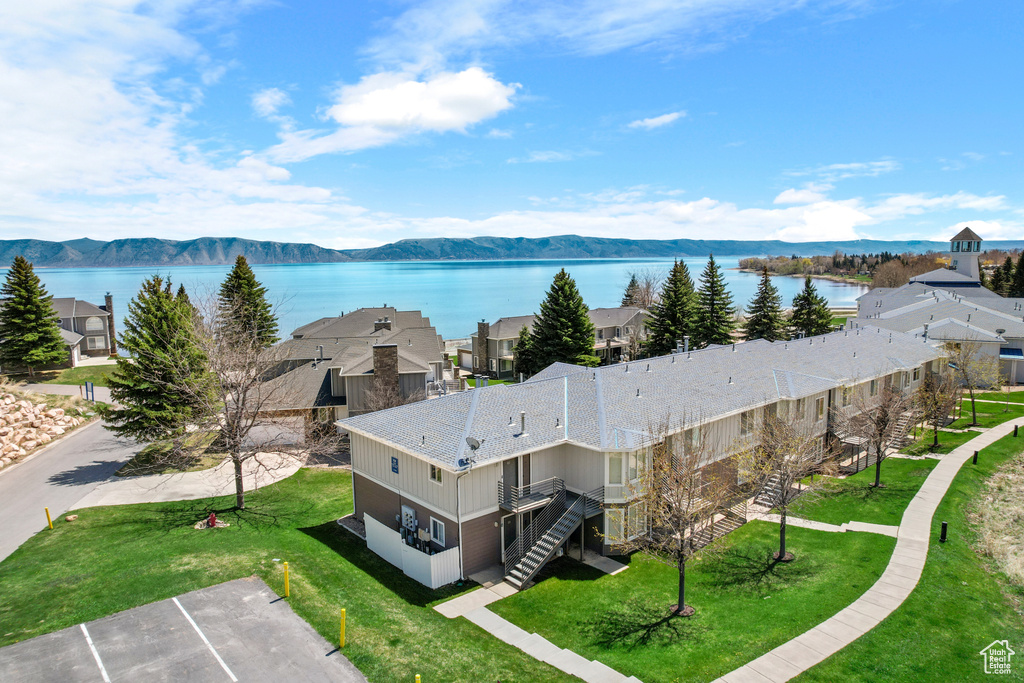 Aerial view of residential area with a water and mountain view