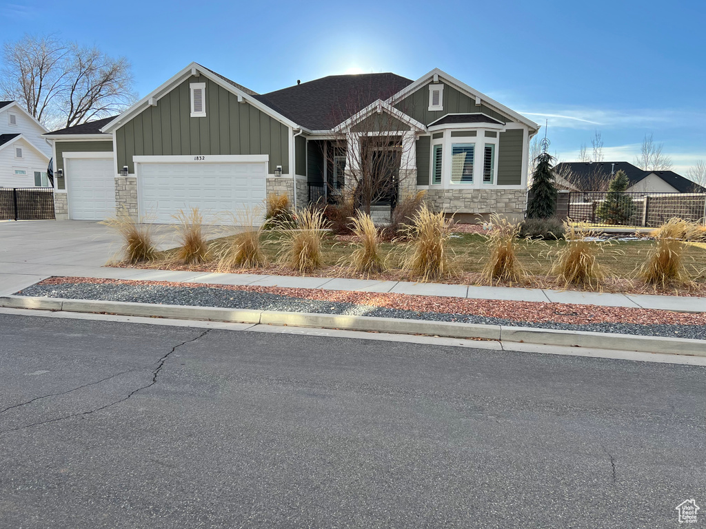 Craftsman-style house with a garage