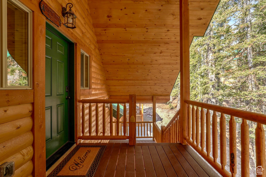 Wooden deck featuring a porch