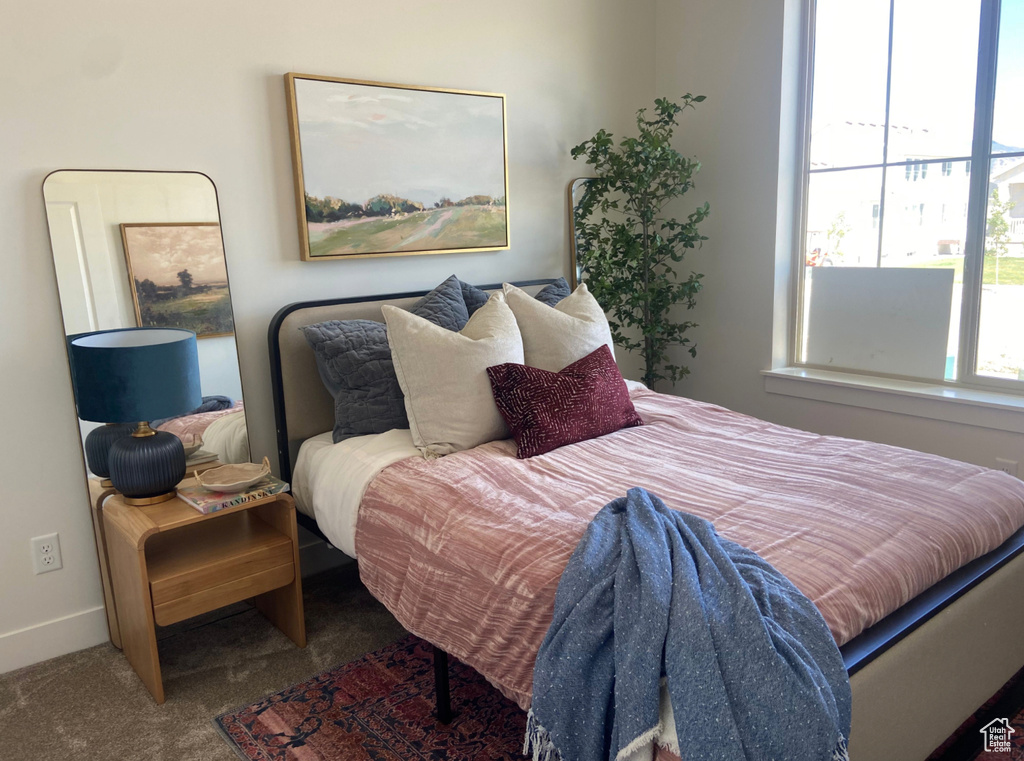Bedroom featuring carpet floors