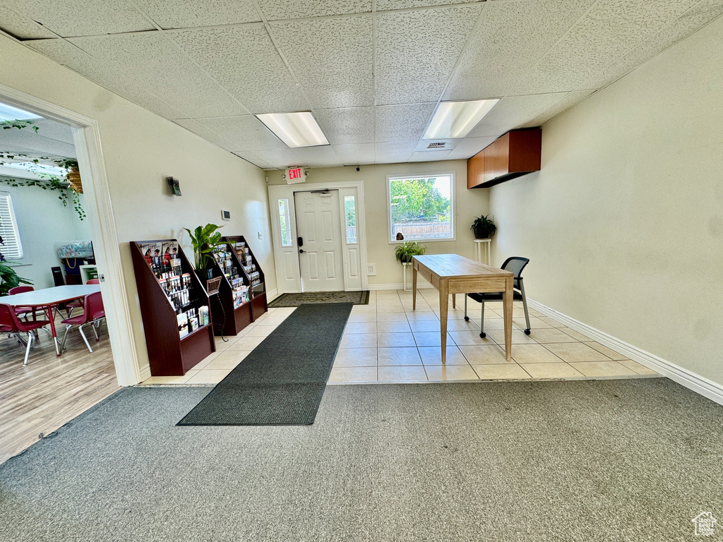 Building lobby with a paneled ceiling
