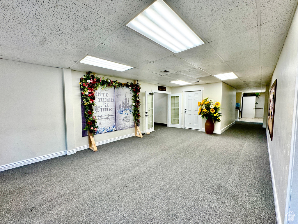 Common area with a drop ceiling