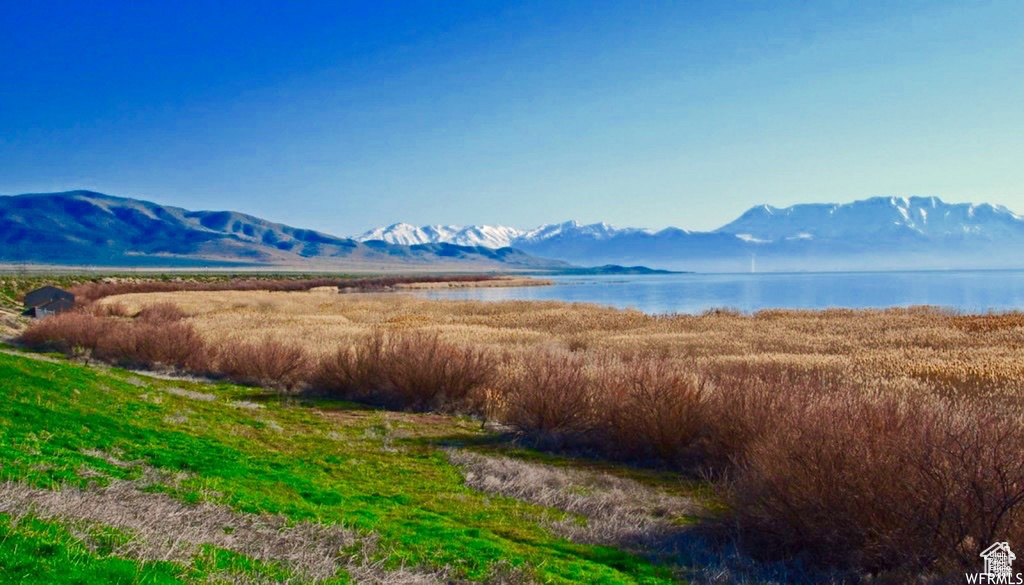 View of mountain feature with a water view