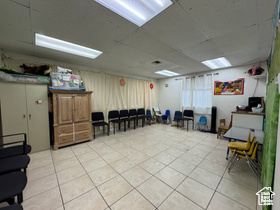 Below grade area with light tile patterned flooring