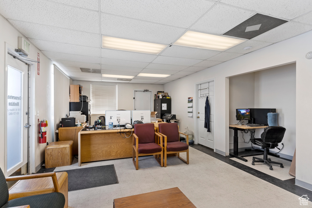 Office area featuring a drop ceiling