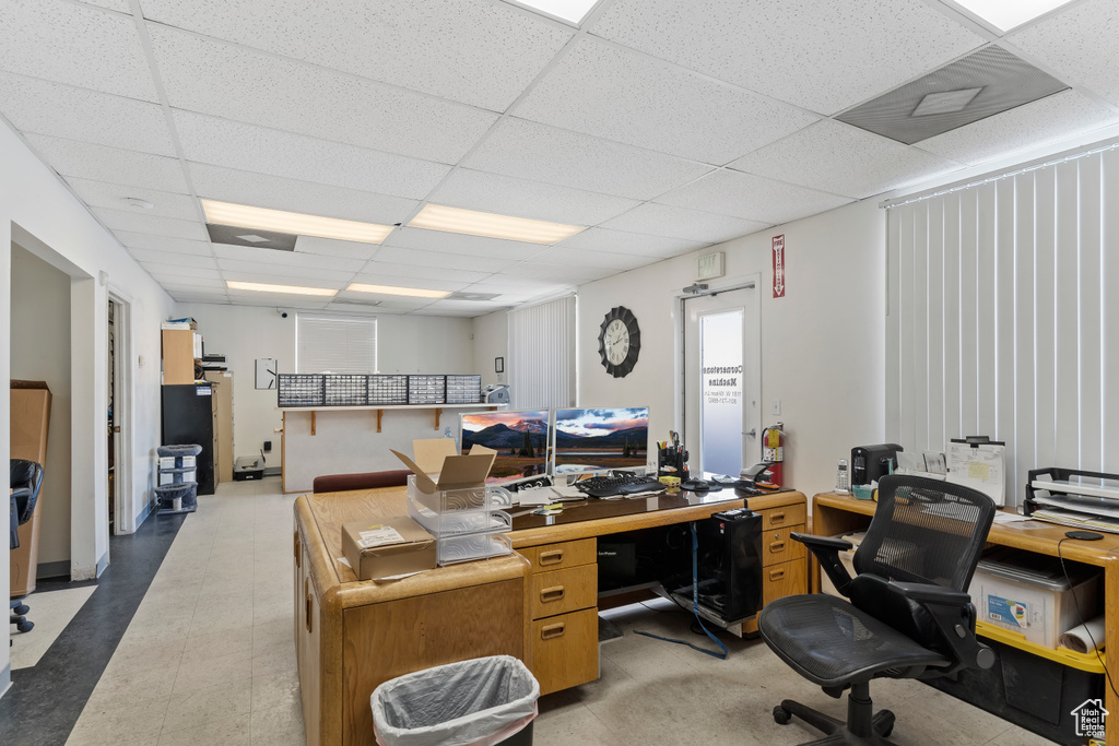 Office featuring a paneled ceiling
