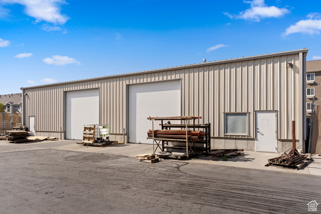 View of outdoor structure featuring a garage