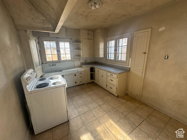 Kitchen featuring range