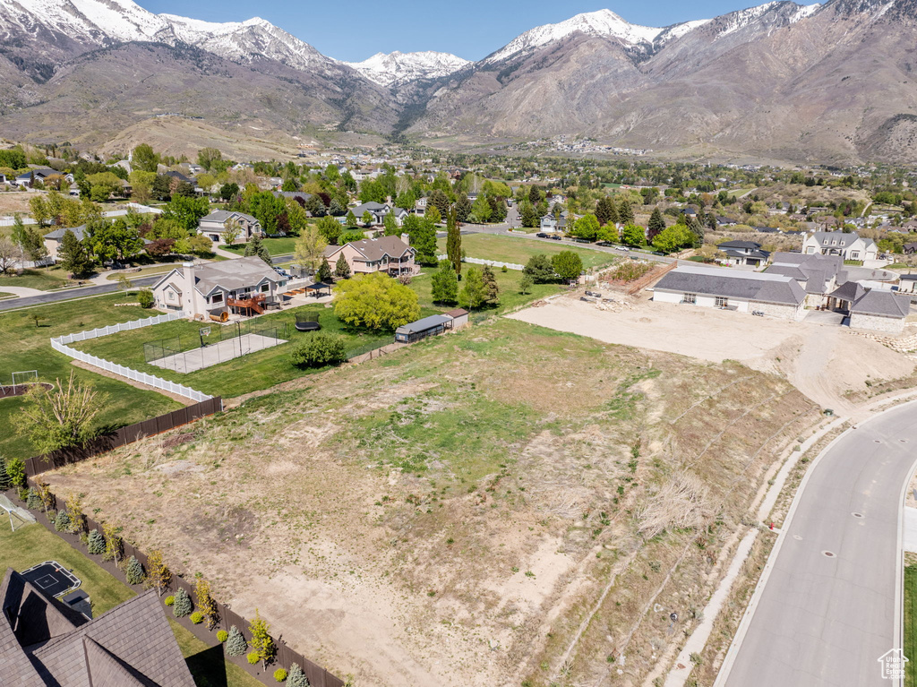 View of mountain background featuring nearby suburban area
