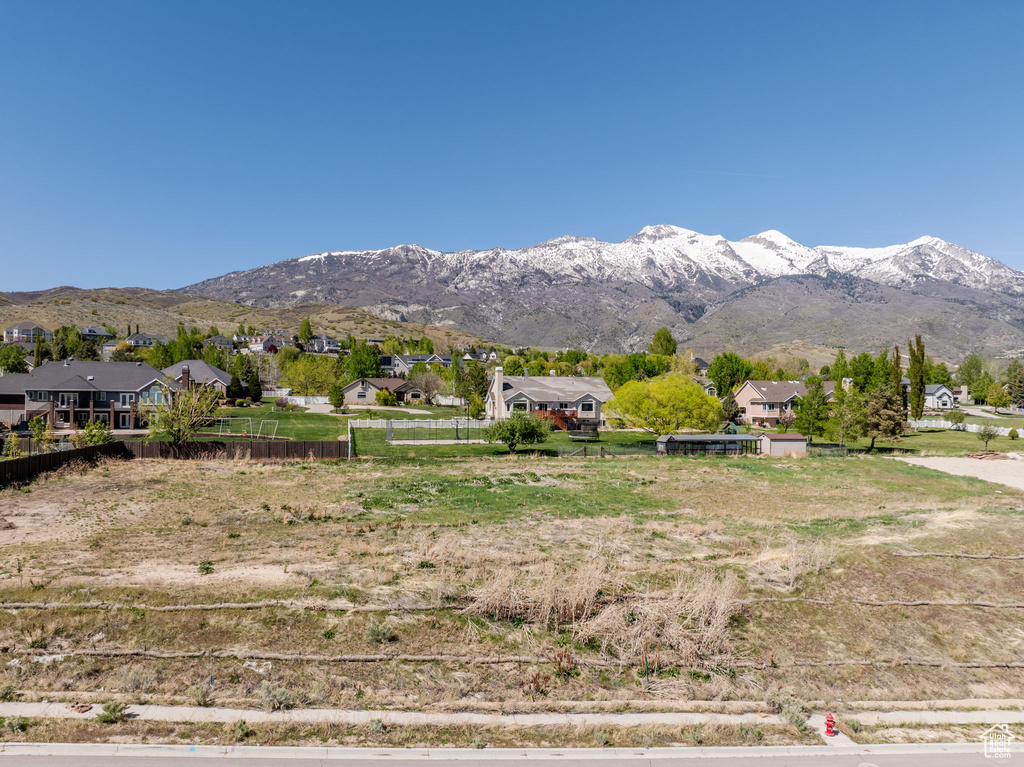 Mountain view featuring nearby suburban area