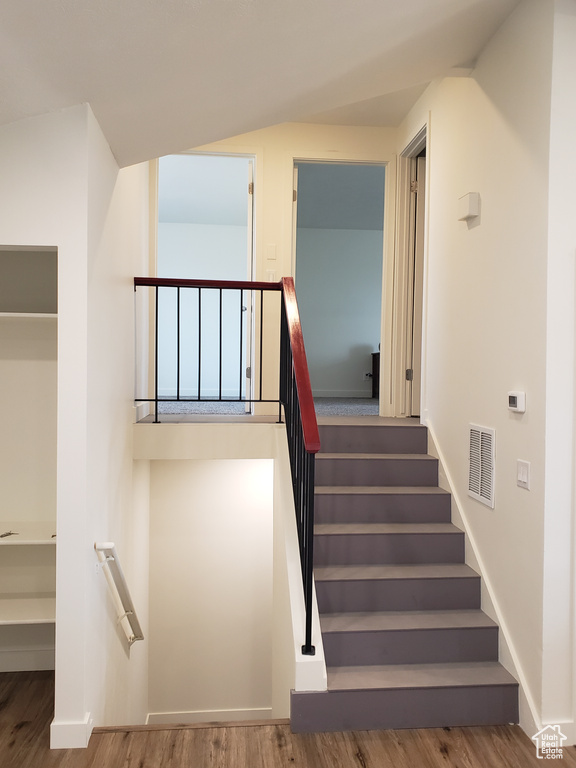 Stairs with wood-type flooring