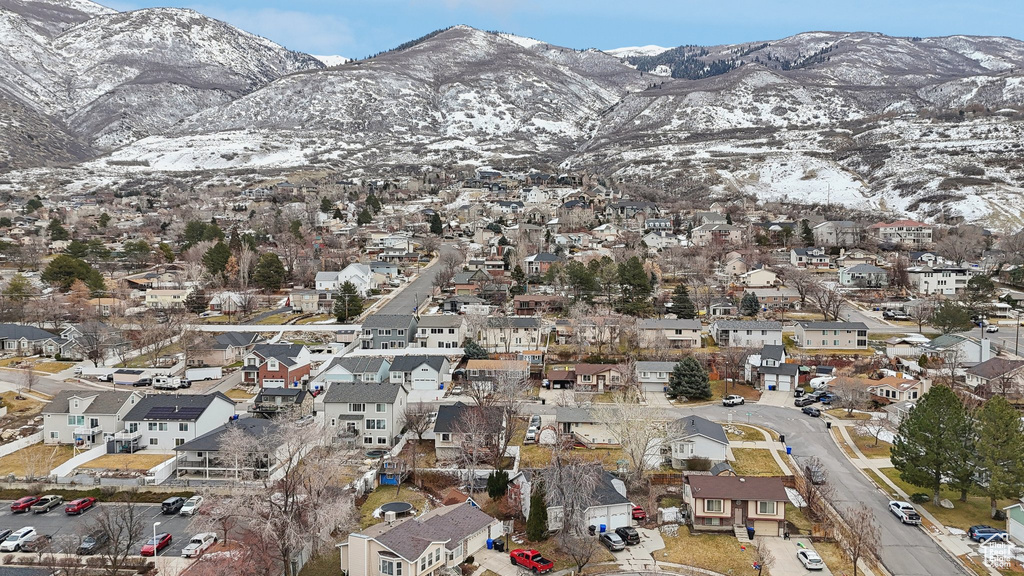 Birds eye view of property featuring a residential view and a mountain view