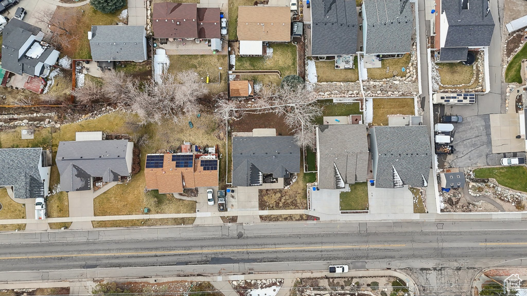 Birds eye view of property with a residential view