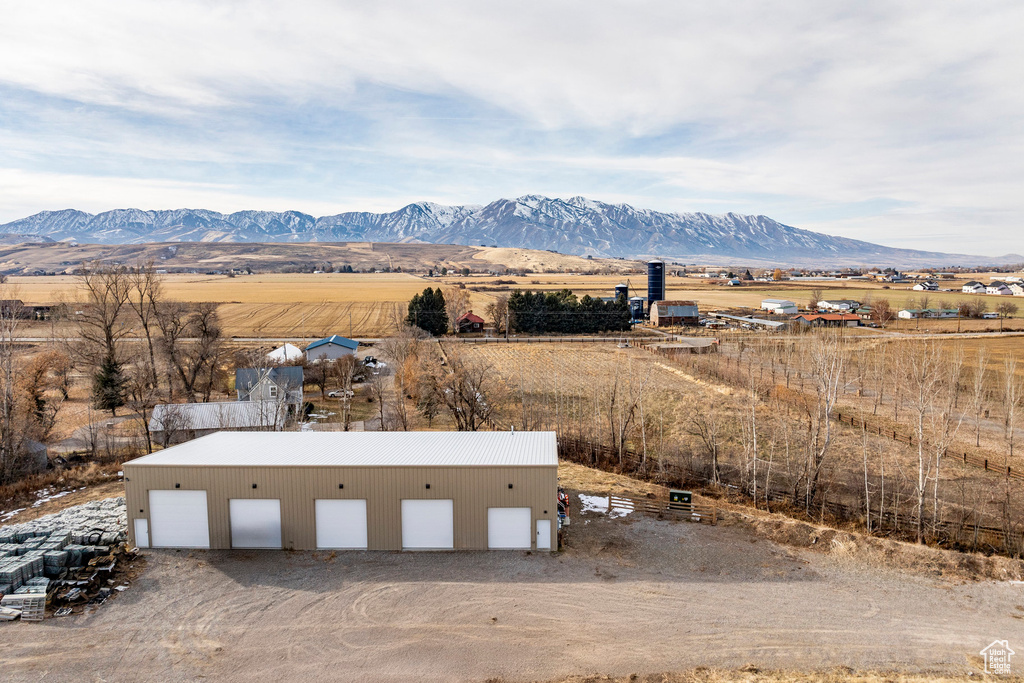 View of mountain background featuring rural landscape