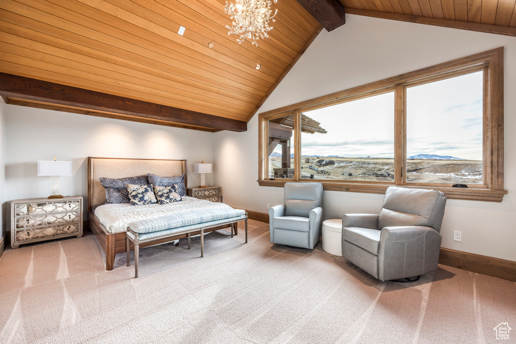 Bedroom featuring multiple windows, wooden ceiling, a chandelier, and light colored carpet