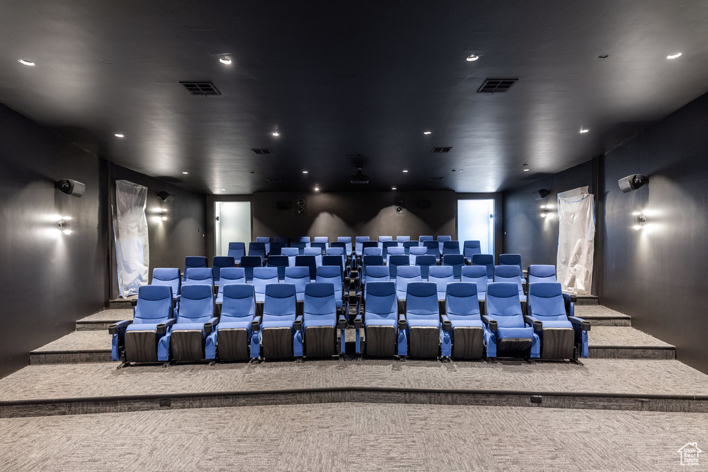 Cinema room featuring carpet flooring and recessed lighting