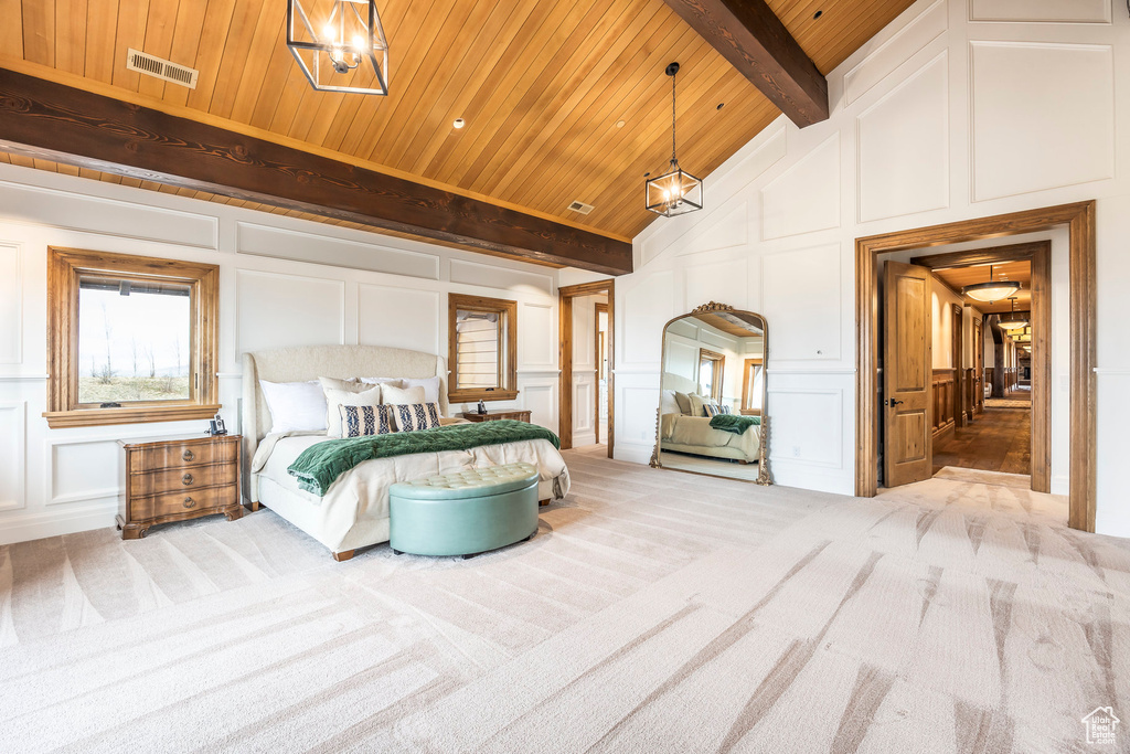 Bedroom featuring a decorative wall, carpet floors, high vaulted ceiling, and a wood ceiling with exposed beams