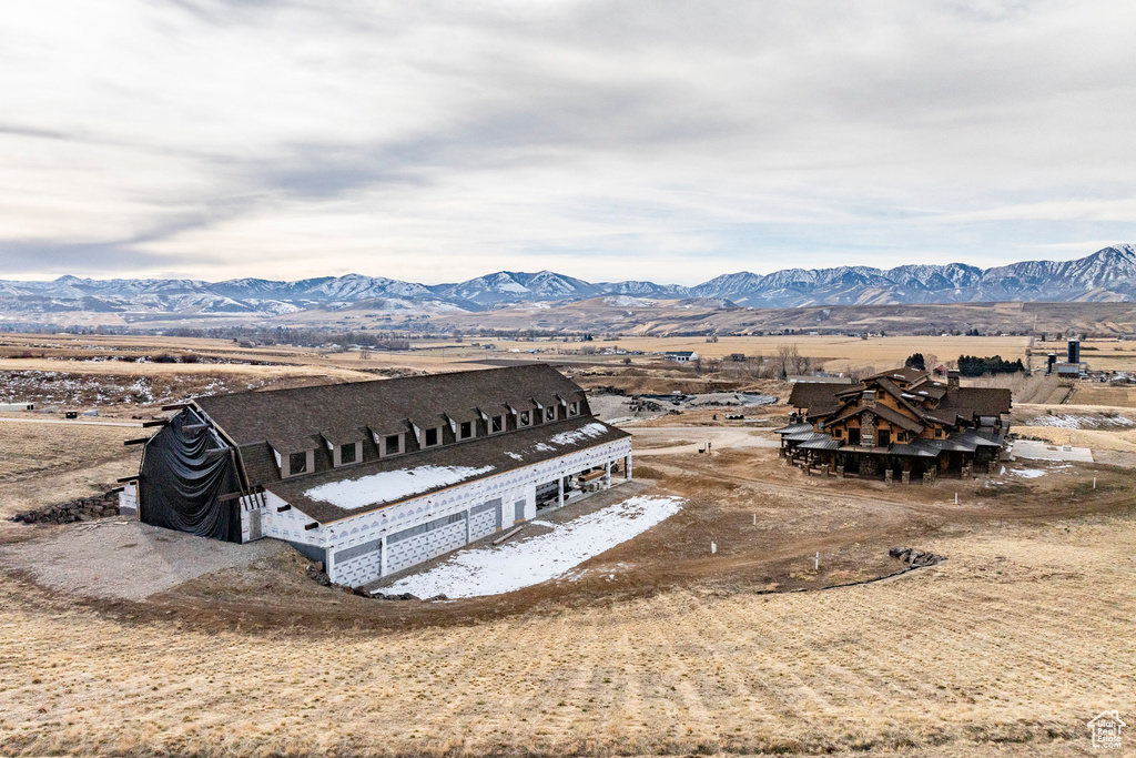 Overview of rural landscape with a mountain backdrop