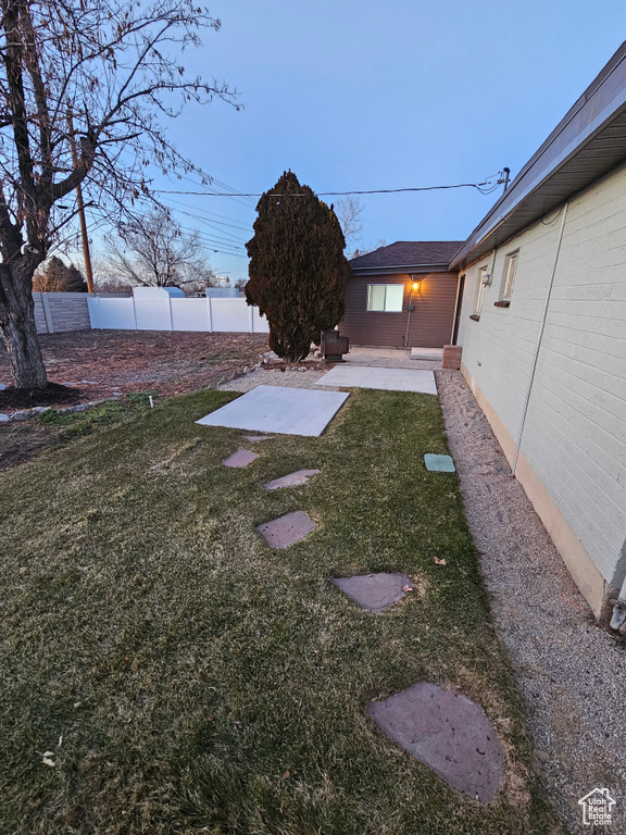 View of yard with a patio