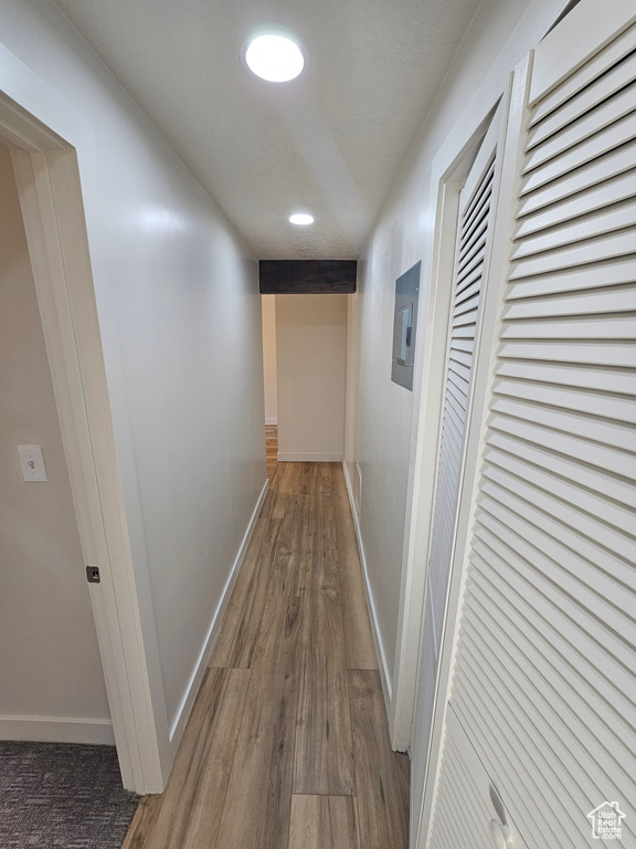 Hall featuring dark hardwood / wood-style floors