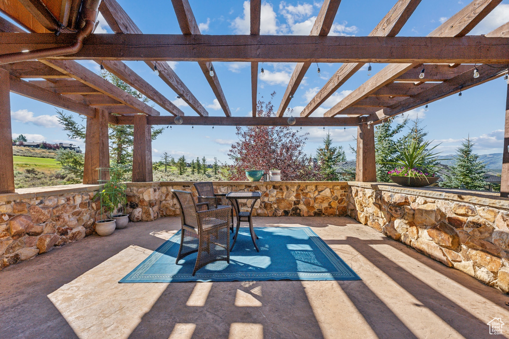 View of patio featuring a pergola