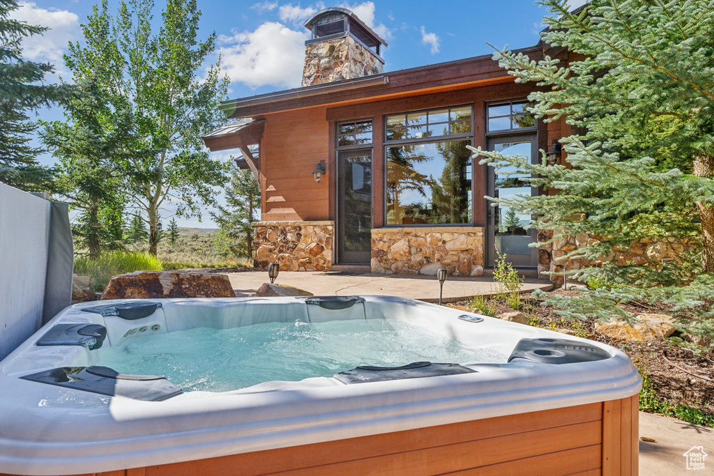 Wooden deck with a hot tub