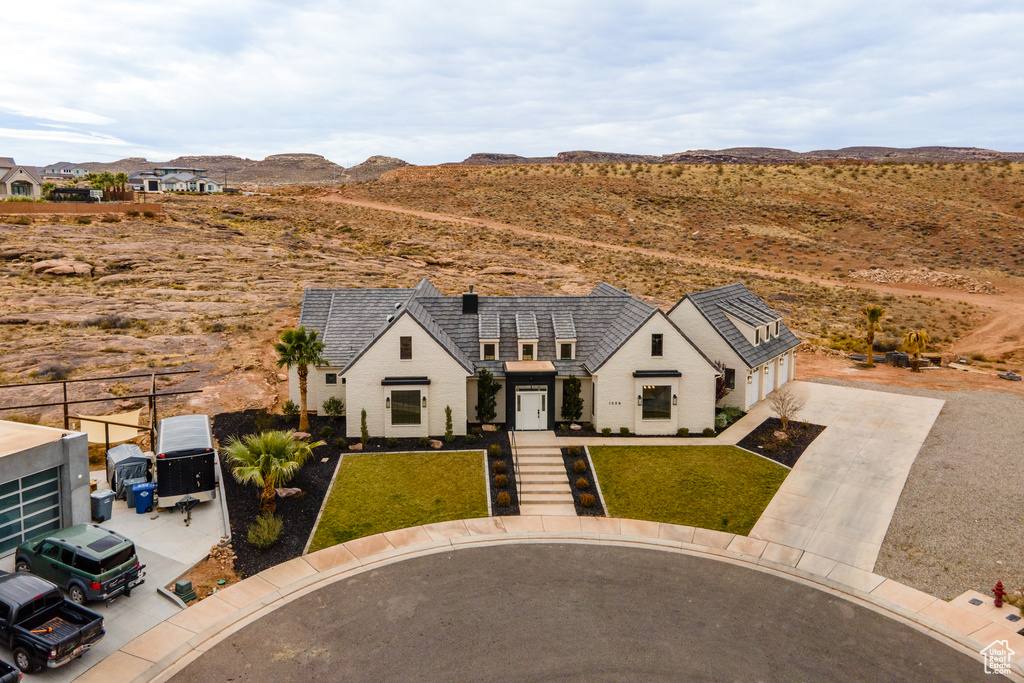 Birds eye view of property featuring a mountain view