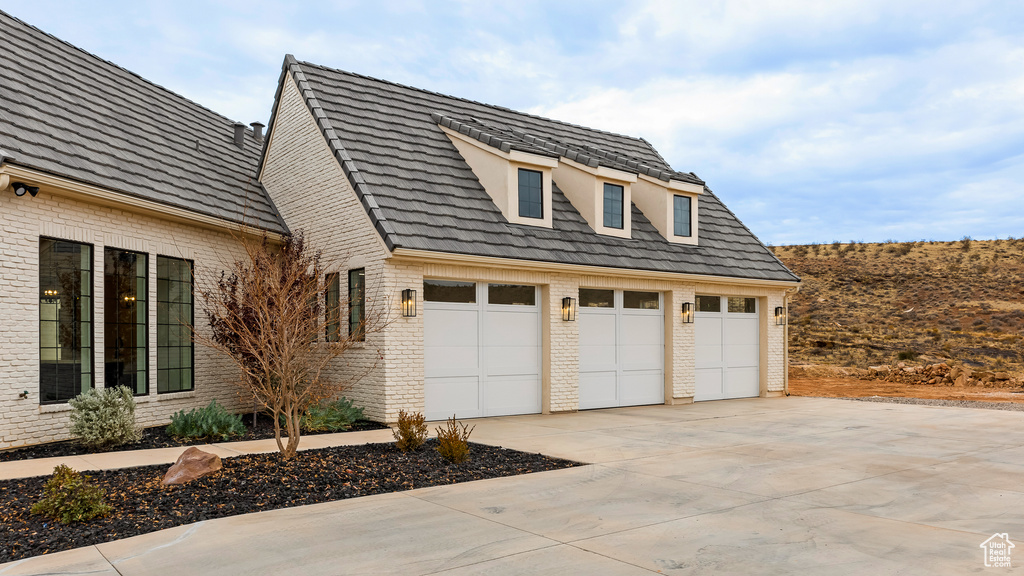 Exterior space featuring a garage