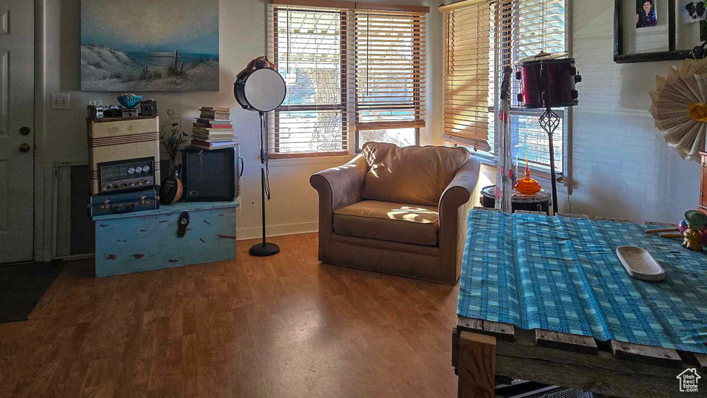 Sitting room featuring hardwood / wood-style flooring