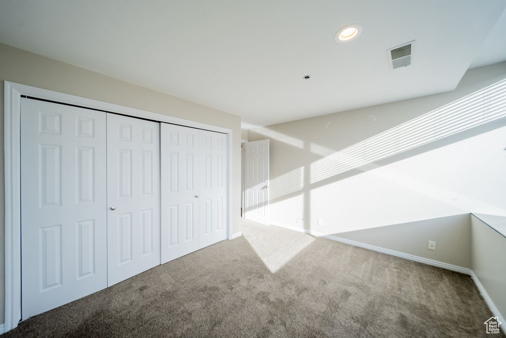 Basement with carpet flooring