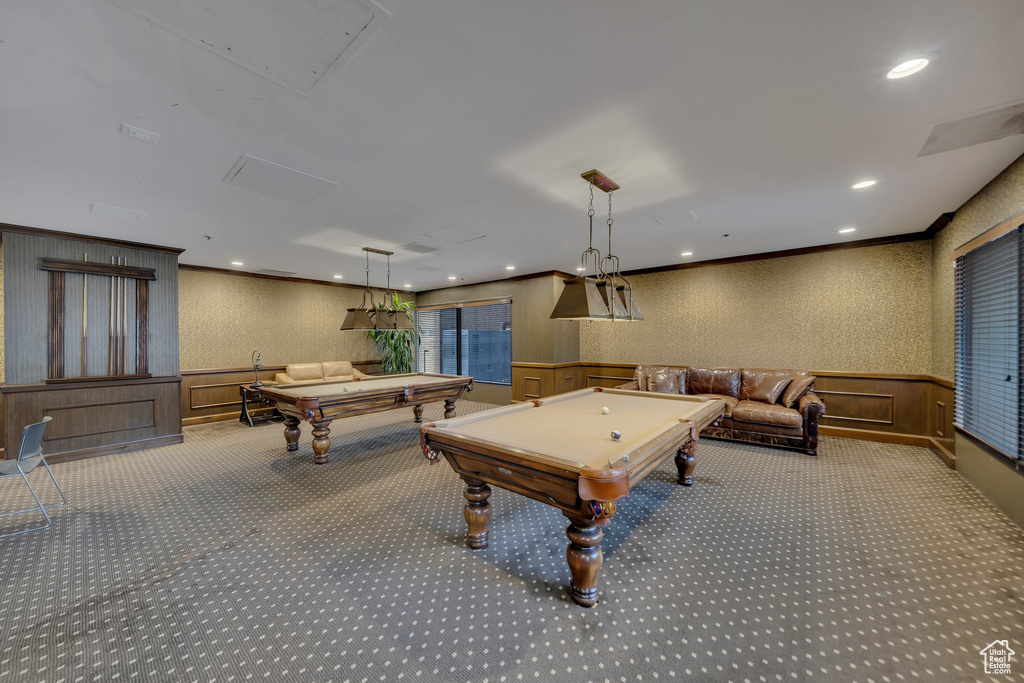Rec room featuring ornamental molding, light carpet, and pool table